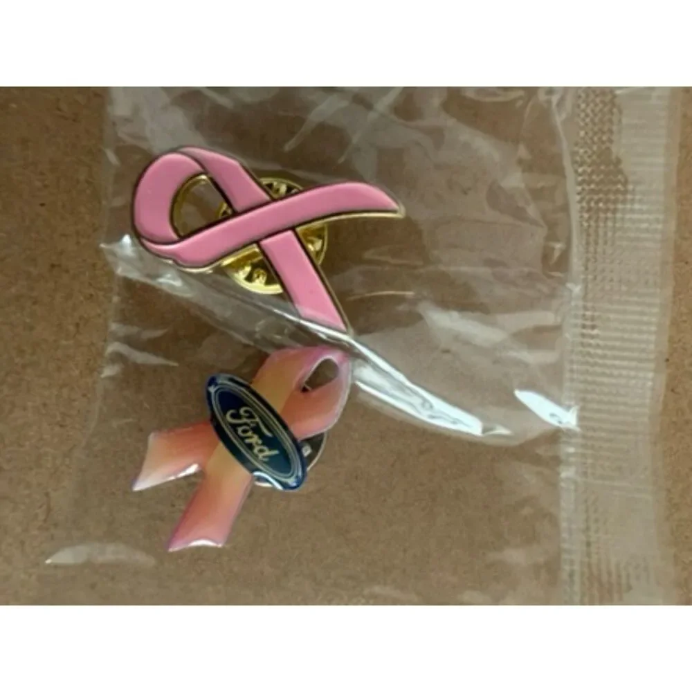 Pink Ribbon label pins one with FORD in center